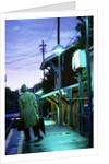 1970s 1980s Impatient Anonymous Man Waiting For Commuter Train by Anonymous