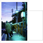 1970s 1980s Impatient Anonymous Man Waiting For Commuter Train by Anonymous