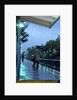 1970s 1980s Anonymous Business Man Holding Umbrella Waiting For A Commuter Train by Anonymous