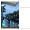 1970s 1980s Anonymous Business Man Holding Umbrella Waiting For A Commuter Train by Anonymous
