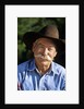 1990s Portrait Of Smiling Cowboy With Gray Mustache Black Hat Blue Shirt Looking At Camera by Corbis