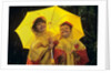1990s Two Laughing Young Girls Holding A Yellow Umbrella And Wearing Yellow Rain Ponchos by Anonymous