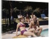 1960s Four People On Patio Couple Man Woman Sitting On Edge Of Swimming Pool by Anonymous