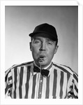 1950s Football Referee Blowing Whistle Looking At Camera by Anonymous
