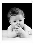 1940s Cute Baby Sucking Thumb Looking At Camera by Anonymous