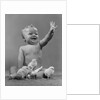 1950s Laughing Waving Baby Surrounded By Little Baby Chicks by Anonymous