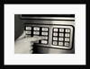 1980s Hand Pressing Buttons On Panel Of Vintage Automatic Teller Machine Atm by Anonymous
