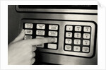 1980s Hand Pressing Buttons On Panel Of Vintage Automatic Teller Machine Atm by Anonymous