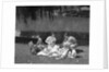 1950s Family Mother Father Son Daughter Picnicking By Lake Outdoor by Anonymous