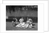 1950s Family Mother Father Son Daughter Picnicking By Lake Outdoor by Anonymous