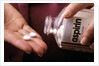 1990s Female Hand Taking Two Aspirin Tablets From Bottle by Anonymous