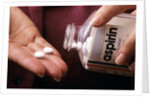 1990s Female Hand Taking Two Aspirin Tablets From Bottle by Anonymous