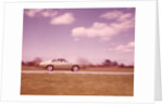 1960s Blurred Motion Of Car On Road by Anonymous