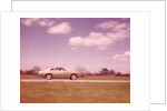 1960s Blurred Motion Of Car On Road by Anonymous