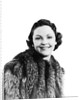 1930s 1940s Portrait Smiling Woman Wearing Fur Coat Looking At Camera by Anonymous