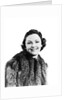 1930s 1940s Portrait Smiling Woman Wearing Fur Coat Looking At Camera by Anonymous