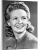 1940s Portrait Of Smiling Woman With Long Blond Curly Hair by Anonymous