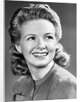 1940s Portrait Of Smiling Woman With Long Blond Curly Hair by Anonymous