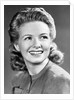 1940s Portrait Of Smiling Woman With Long Blond Curly Hair by Anonymous