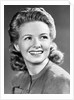 1940s Portrait Of Smiling Woman With Long Blond Curly Hair by Corbis