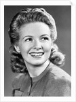1940s Portrait Of Smiling Woman With Long Blond Curly Hair by Anonymous