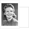 1940s Portrait Of Smiling Woman With Long Blond Curly Hair by Anonymous