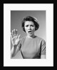1960s Alarmed Woman Holding Up Her Hand To Stop Something by Anonymous