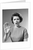 1960s Alarmed Woman Holding Up Her Hand To Stop Something by Anonymous