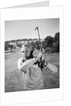 1960s Man Playing Golf Hitting Golf Ball From Fairway With Iron Club by Anonymous