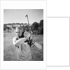 1960s Man Playing Golf Hitting Golf Ball From Fairway With Iron Club by Anonymous