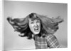 1960s Angry Woman Yelling Gnashing Teeth Hair Flying Looking At Camera by Anonymous
