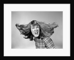 1960s Angry Woman Yelling Gnashing Teeth Hair Flying Looking At Camera by Anonymous