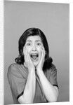 1960s Brunette Woman Screaming Mouth Wide Open Hands To Face Facial Expression Fear Scream Surprise Character Funny Face by Anonymous