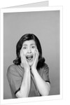 1960s Brunette Woman Screaming Mouth Wide Open Hands To Face Facial Expression Fear Scream Surprise Character Funny Face by Anonymous