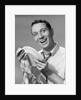 1950s Smiling Man Drying Plate With Dish Towel Looking At Camera by Anonymous