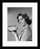 1950s 1960s Smiling Woman Holding Freshly Baked Pie Looking At Camera by Anonymous