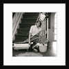 1960s 1970s Exhausted Housewife Sitting At Bottom Of Stairs Surrounded By House Cleaning Equipment by Anonymous