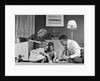 1950s Family Of 4 Gathered In Living Room Playing With Letter Blocks by Anonymous