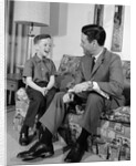 1960s Boy Sitting On Couch Smiling Laughing Talking With Dad by Anonymous