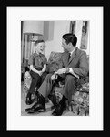 1960s Boy Sitting On Couch Smiling Laughing Talking With Dad by Anonymous