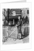 1940s Smiling Pretty Young Teenage Girl Standing By White Picket Fence In Front Of Stone House In Autumn Looking At Camera by Anonymous