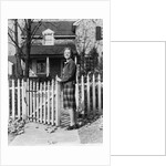 1940s Smiling Pretty Young Teenage Girl Standing By White Picket Fence In Front Of Stone House In Autumn Looking At Camera by Anonymous