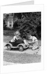1940s 1930s Boy On Sidewalk Fixing Headlight Of Toy Car Driven By Little Girl Playing Outdoor by Anonymous