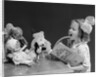 1930s Enthusiastic Little Girl Big Bow Ribbon In Her Hair Singing To Assembled Group Of Dolls Toys And Stuffed Animals by Anonymous