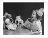 1930s Enthusiastic Little Girl Big Bow Ribbon In Her Hair Singing To Assembled Group Of Dolls Toys And Stuffed Animals by Anonymous