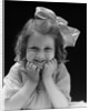 1930s Portrait Smiling Brunette Girl With Big Ribbon Bow In Her Hair Looking At Camera by Anonymous
