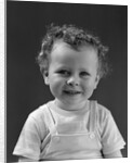 1940s Curly Haired Little Boy Portrait Smiling Looking At Camera by Anonymous