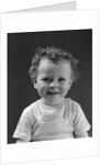 1940s Curly Haired Little Boy Portrait Smiling Looking At Camera by Anonymous
