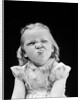 1940s Portrait Of Girl Sticking Out Tongue Wrinkled Up Nose by Anonymous