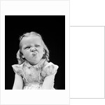 1940s Portrait Of Girl Sticking Out Tongue Wrinkled Up Nose by Anonymous